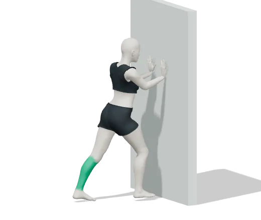 Calf stretch, step 2: Step one foot back, heel down, lean in